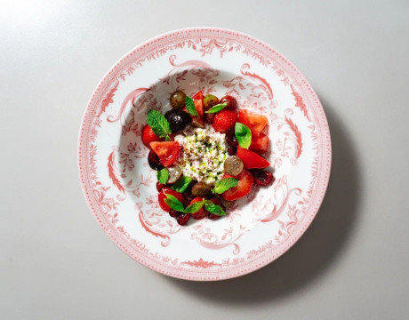 Stracciatella with berries, tomatoes, and homemade balsamic glaze