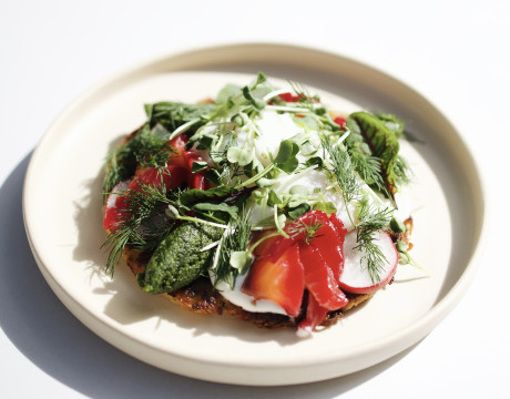 Potato pancake with salmon and poached eggs